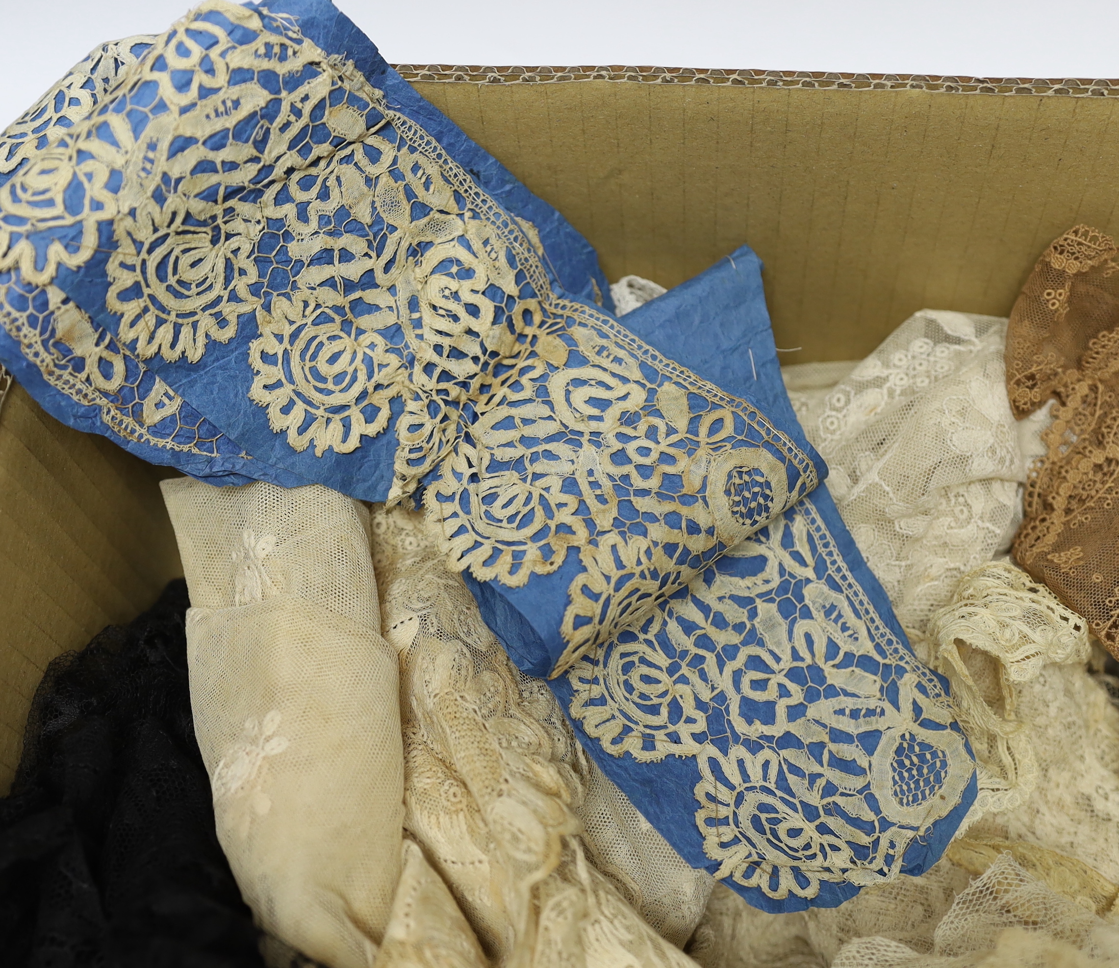 19th century mixed hand made and machine lace: a cream lace needle run bonnet veil, a similar stole and two lengths of wide trimming, together with other lace items and a quantity of black lace